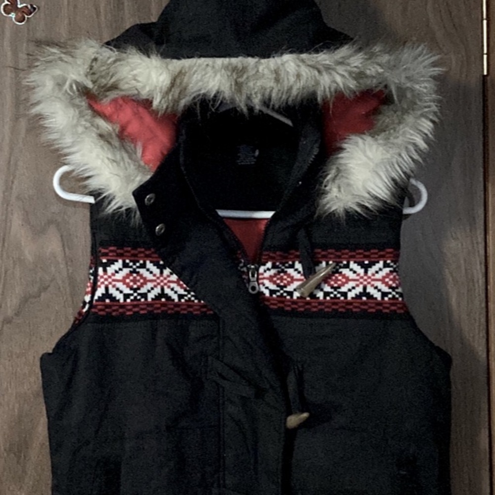 Cruel woman’s vest with faux fur hood